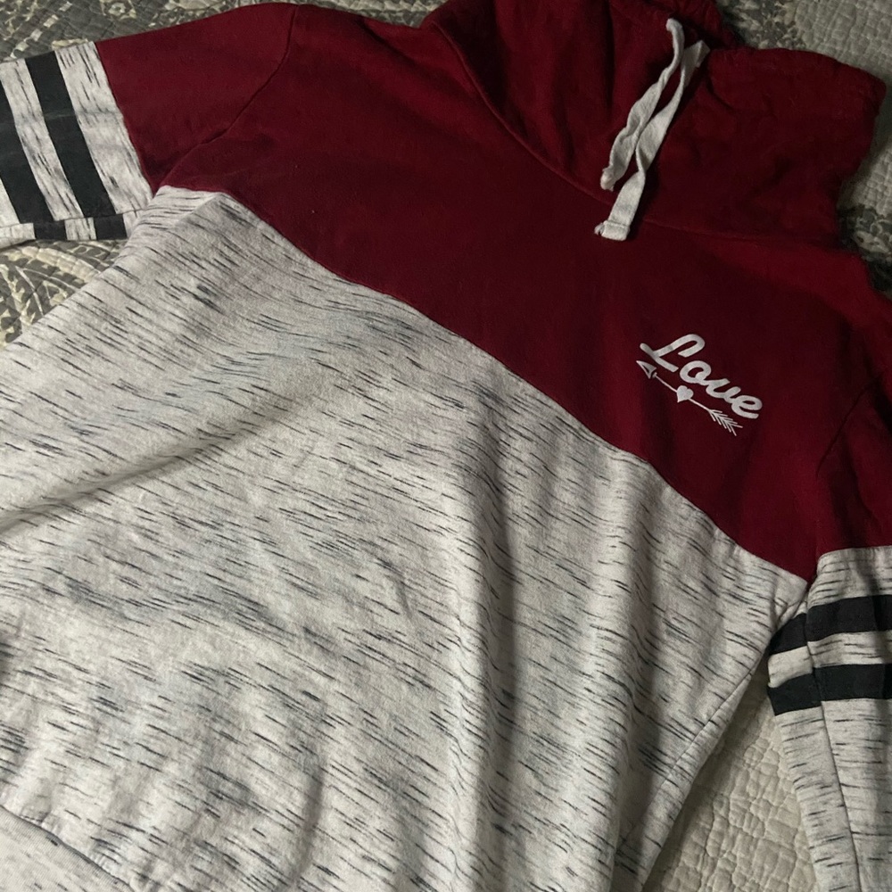 The Burgundy/gray love thick shirt.